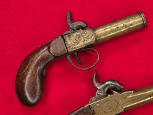 BRASS FRAME AND BARREL SINGLE SHOT PERCUSSION BOOT PISTOLS
