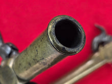 BRASS FRAME AND BARREL SINGLE SHOT PERCUSSION BOOT PISTOLS